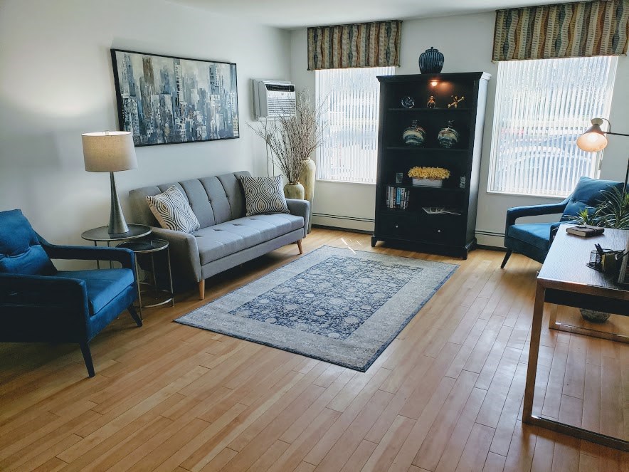 a living room with a couch and a table