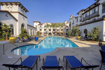 Pool, spa and expansive sundeck with adjacent outdoor entertainment areas with BBQ’s and outdoor TV’s