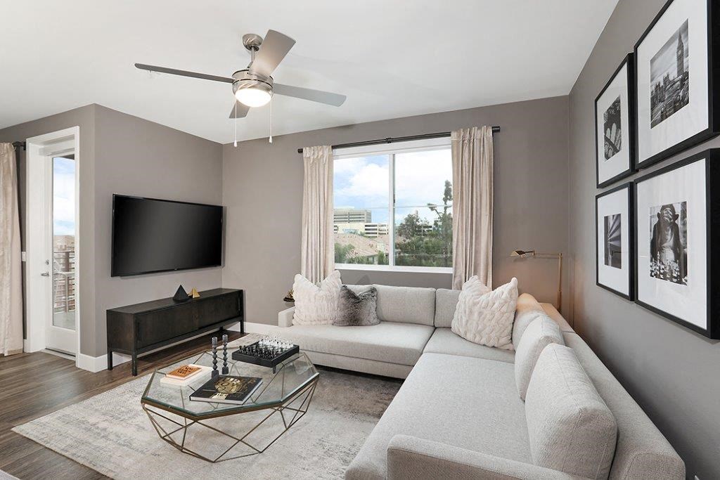 a living room with a couch and a television