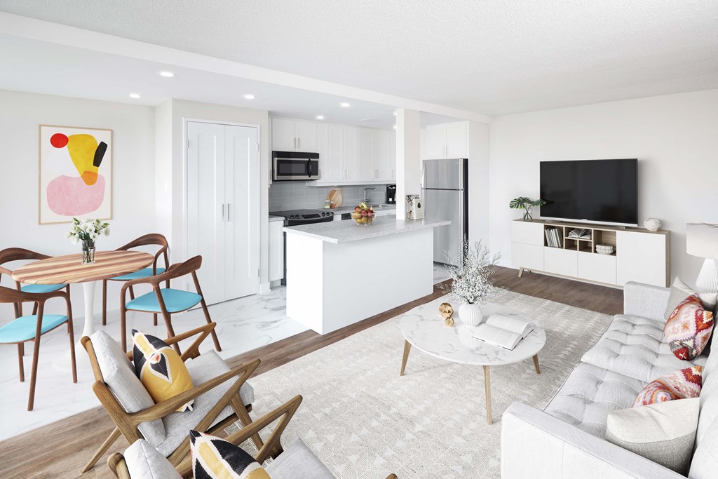 a living room with a kitchen and a dining room