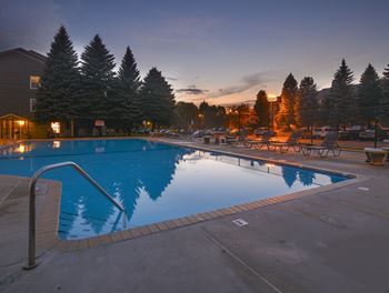 Sparkling Outdoor Pool With Sundeck