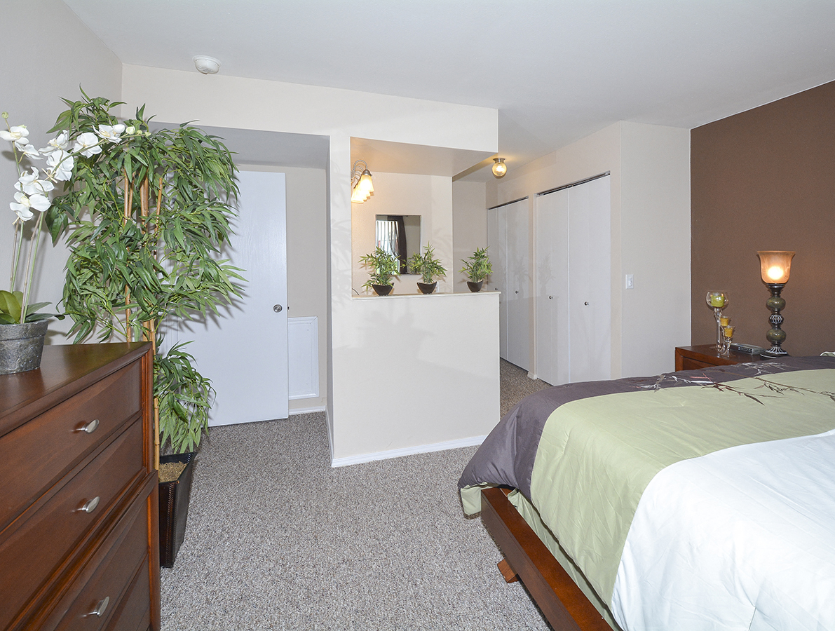 Bedroom with Attached Bathroom and Double Closets