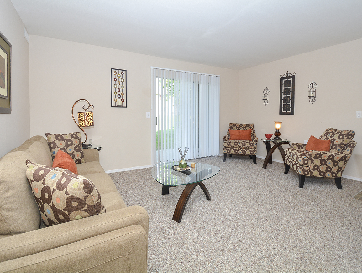 Carpeted Living Room with Sliding Glass Patio Door