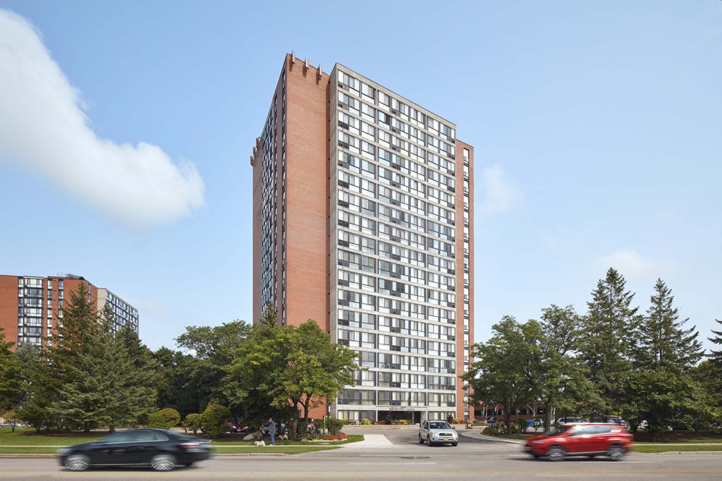 a rendering of a tall building on a city street