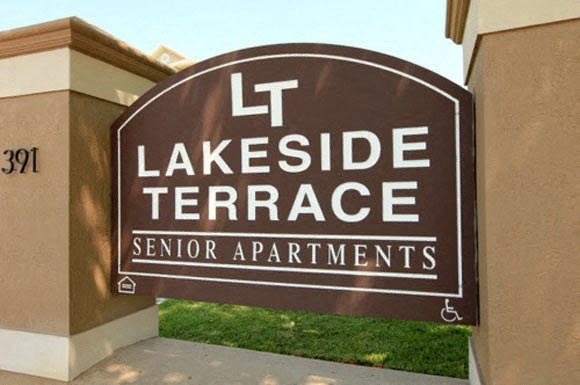 a sign for lakeside terrace in front of a building
