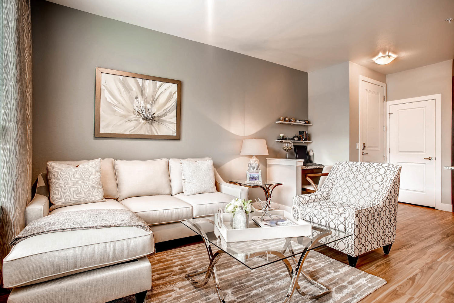 a living room with a couch and a table