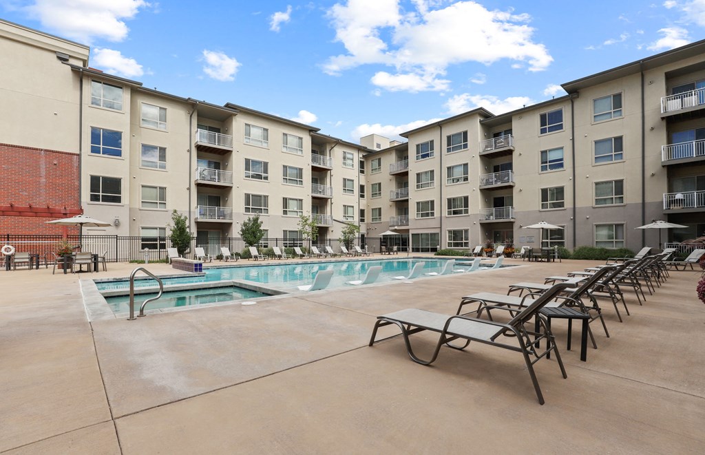 our apartments have a large pool and lounge chairs