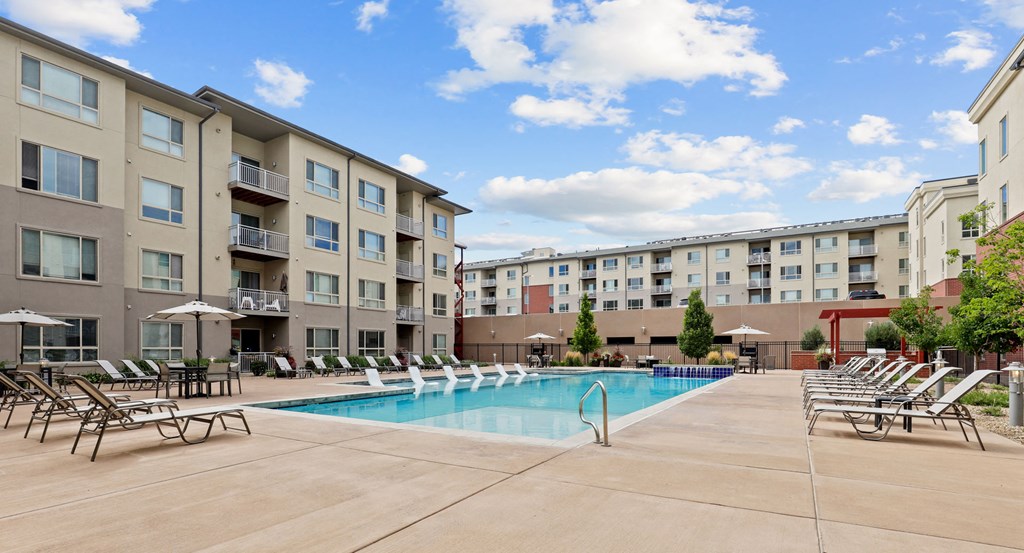 our apartments have a large pool and lounge chairs