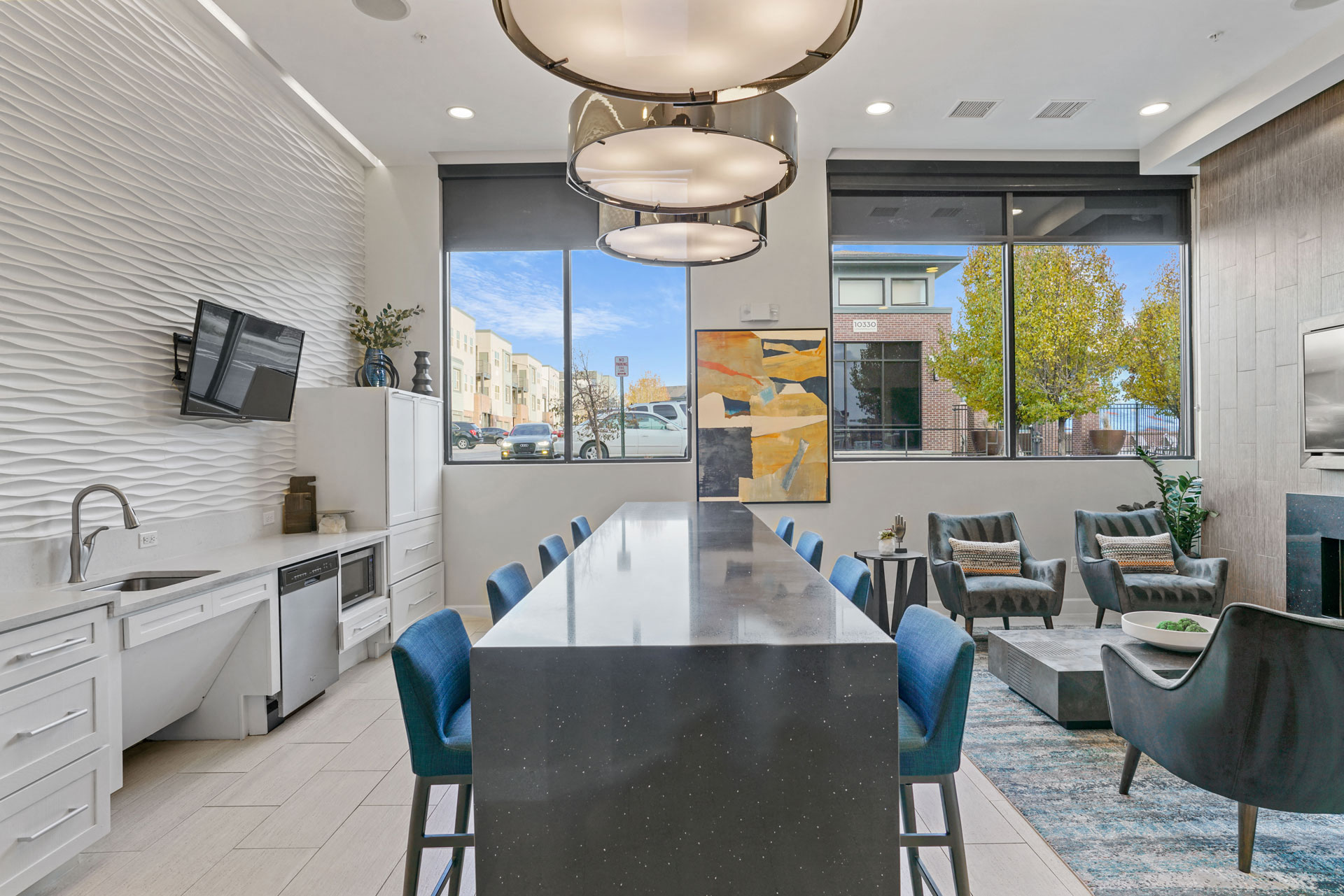 a kitchen and dining area with a large table and chairs