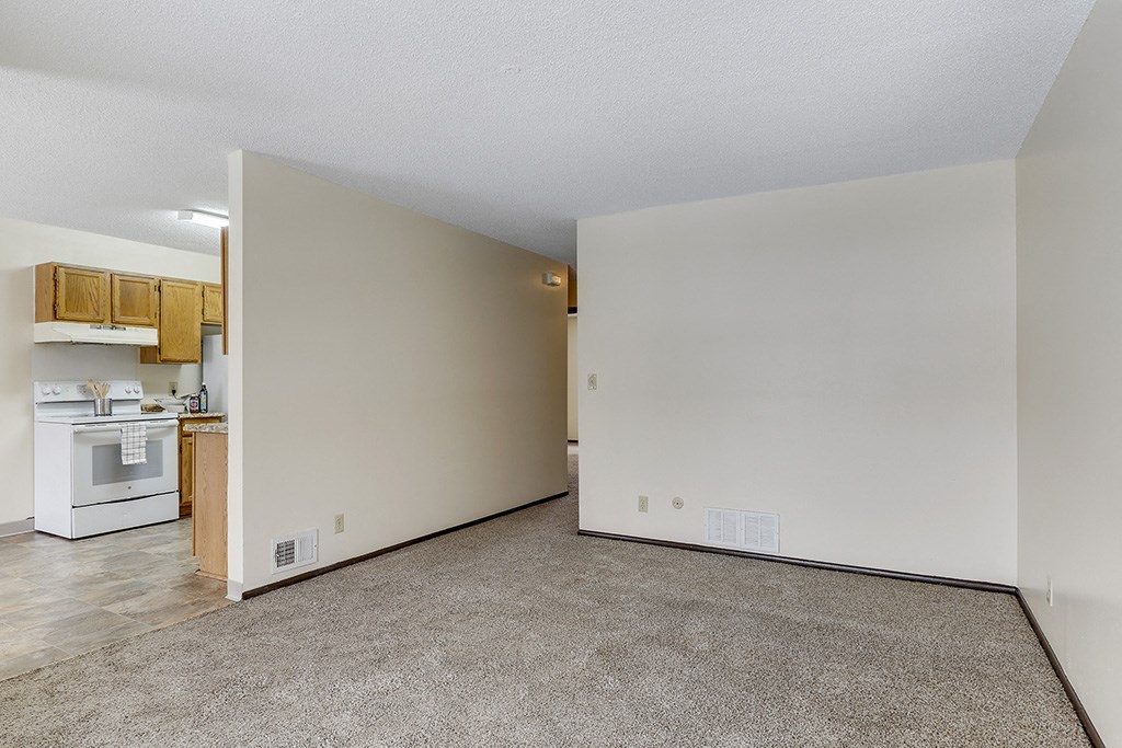 Living Room With Kitchen at Torre de San Miguel, St. Paul, MN, 55107