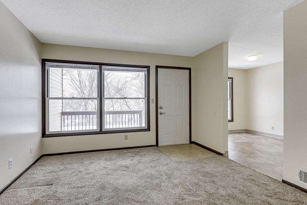 Carpeted Living Room at Torre de San Miguel, Minnesota, 55107