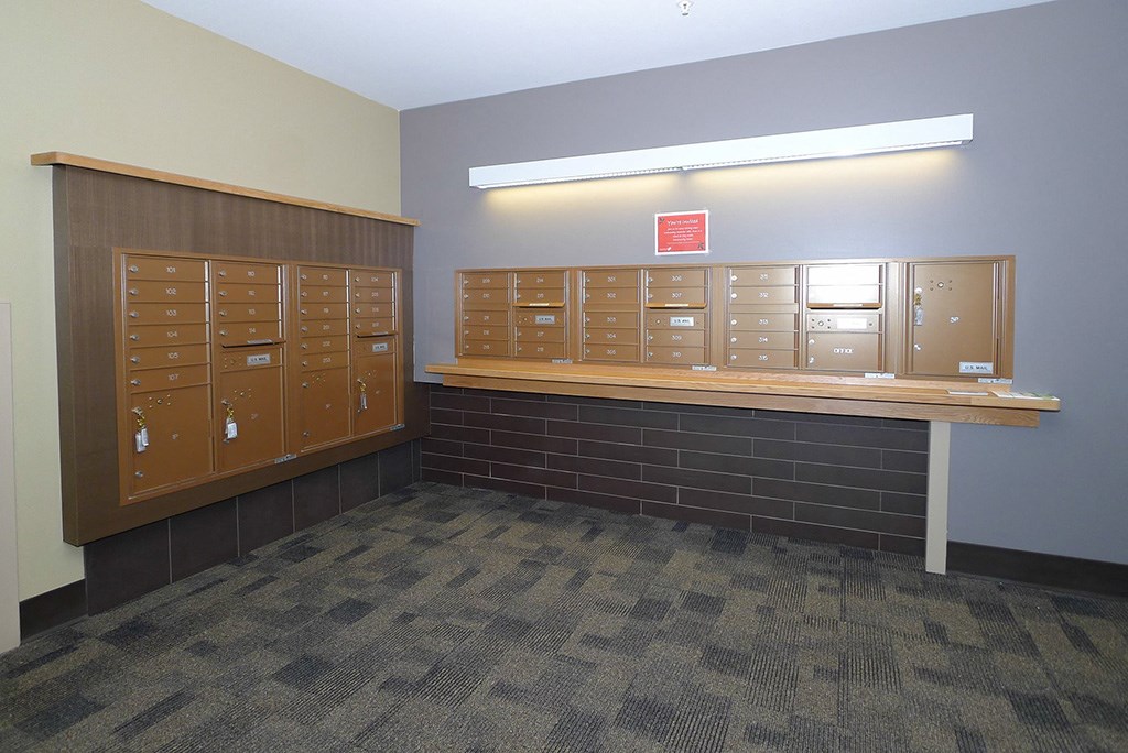 a locker room with lockers and a counter