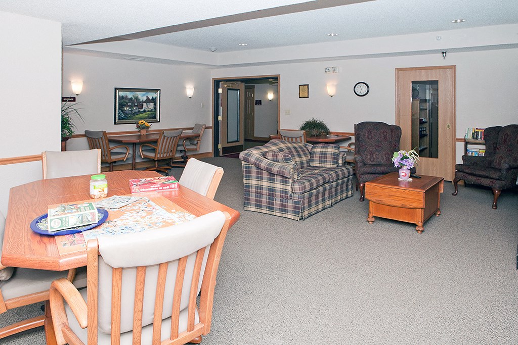 a living room with a table and a couch