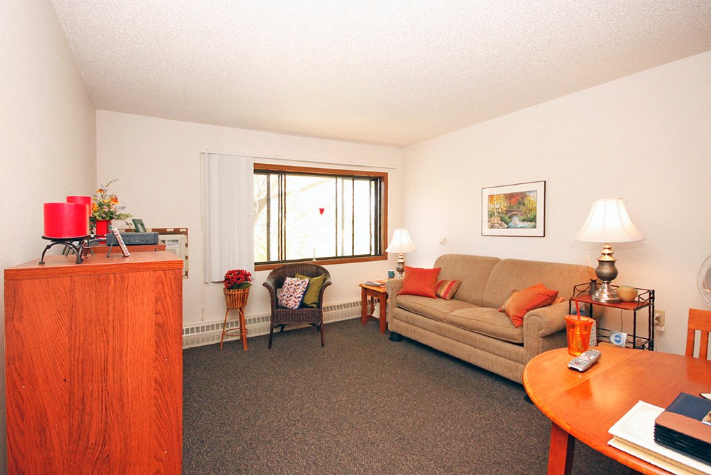 a living room with a couch and a table