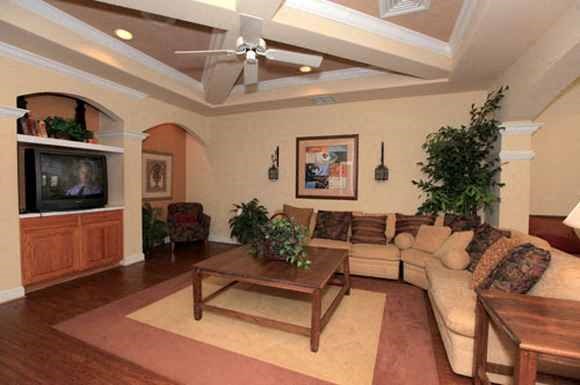 a living room with a couch and a television