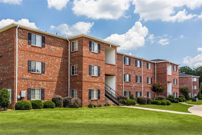 Apartment Complex Exterior With Beautiful Brick Construction at Hidden Creek Village Apartments, Fayetteville, NC, 28314 - Photo Gallery 1