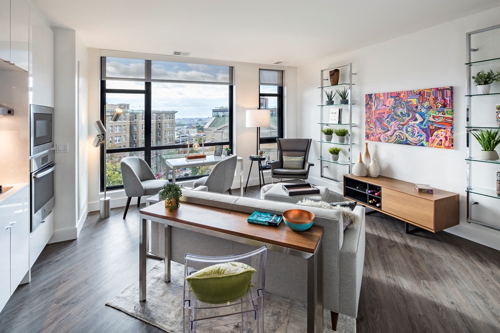 a living room with a couch and a table