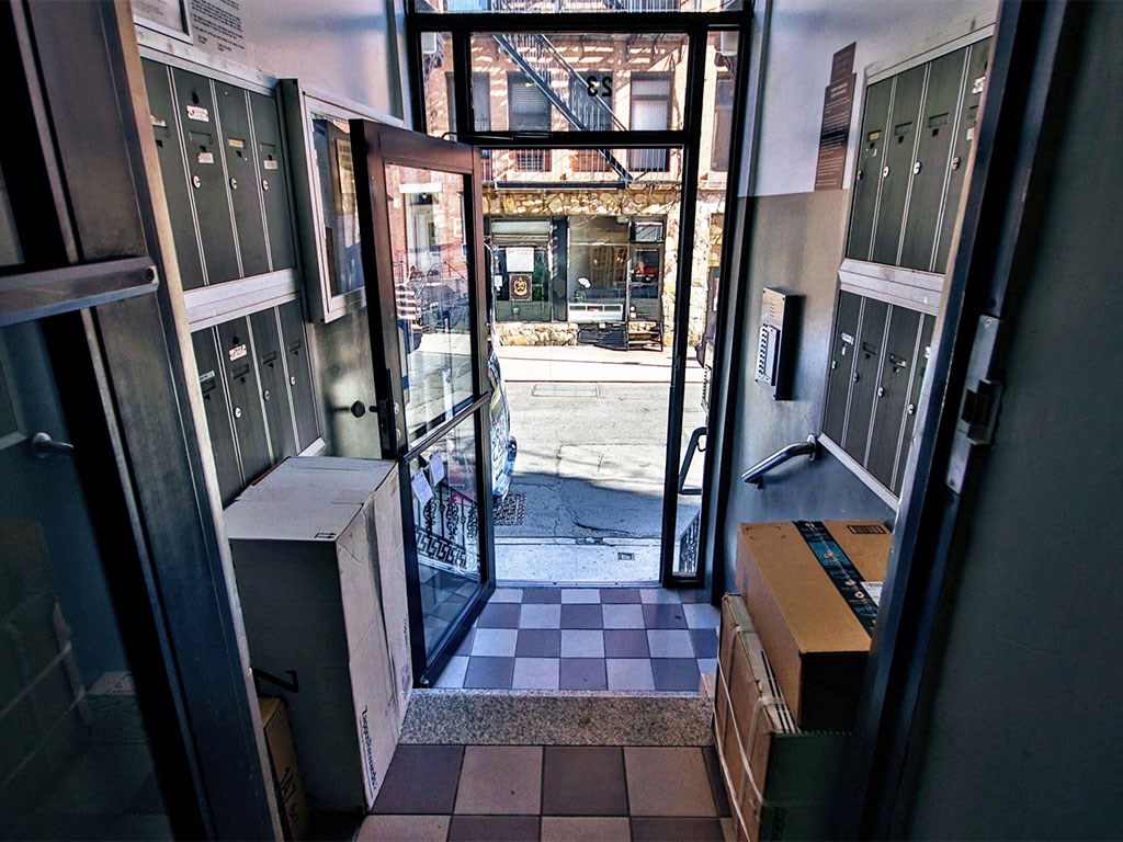 a view of the front door of a building from inside