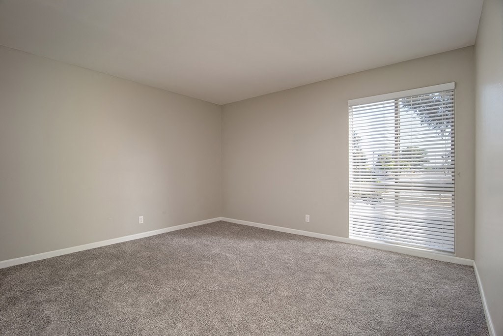 Living Room With Glass Door at Parc at 5 Apartments, Downey