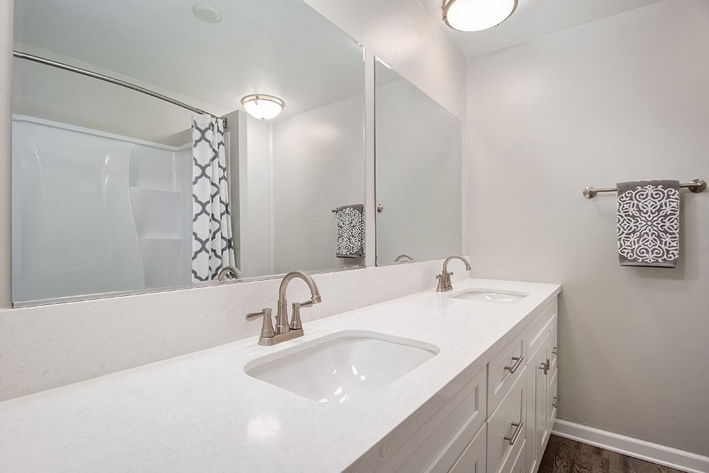 Bathroom with vanity sink at Parc at 5 Apartments, Downey, California
