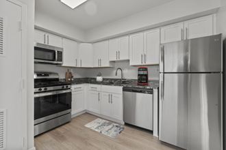 Updated Kitchen with Stainless Steel, Gas Cooking and modern cabinetry
