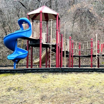 a playground with a slide and a