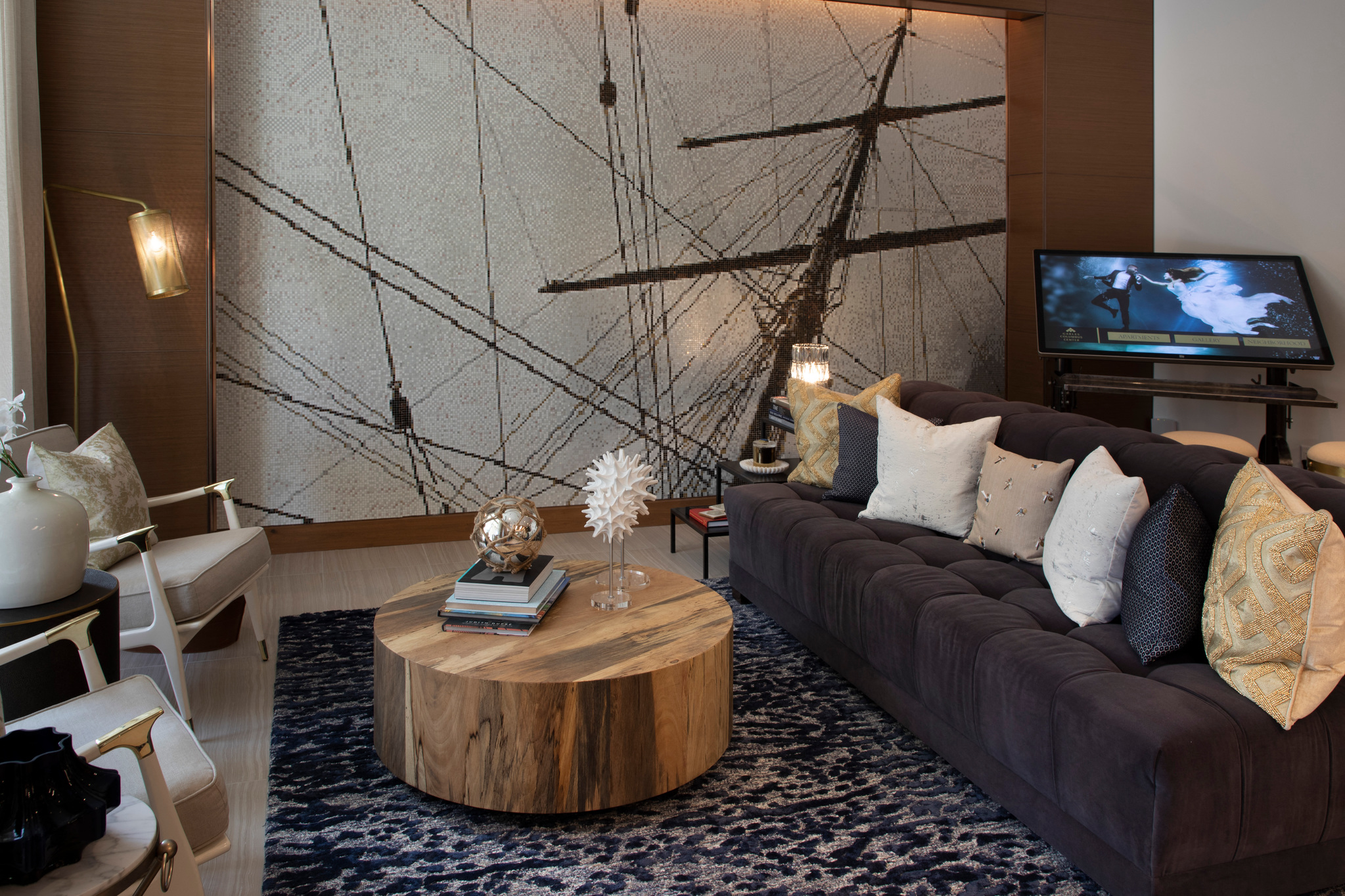 a living room with a brown couch and a wooden coffee table