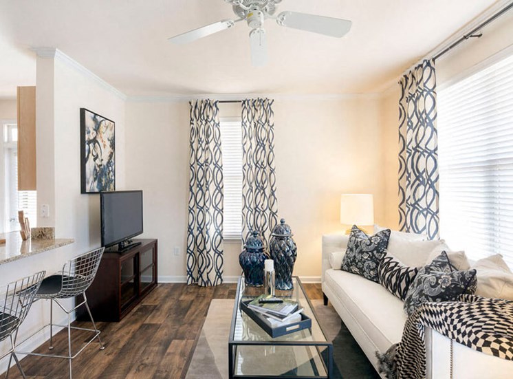 Living Room with wood-look flooring at Westwind Farms Apartments