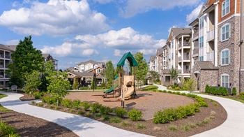 kids playground at Atley on the Greenway Apartments in Ashburn, VA
