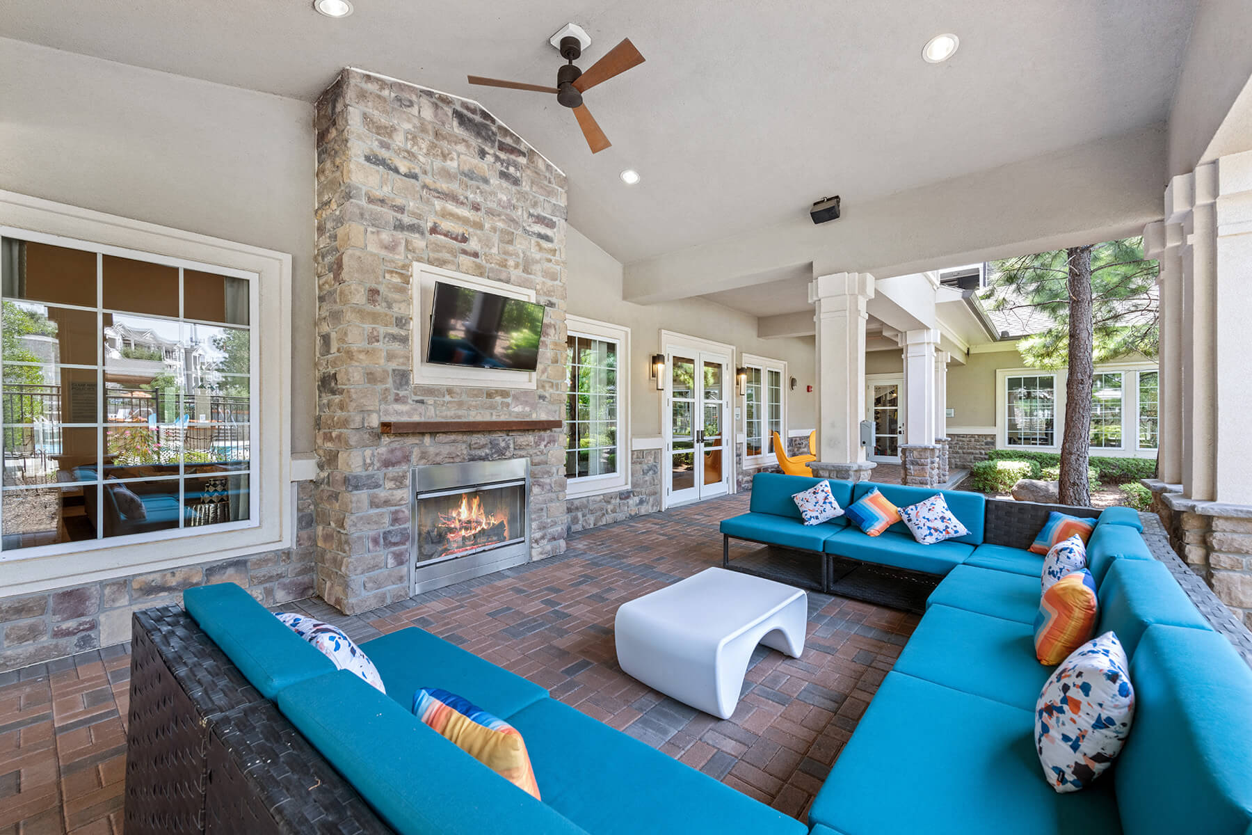 Outdoor fireside lounge at Atley on the Greenway Apartments in Ashburn VA