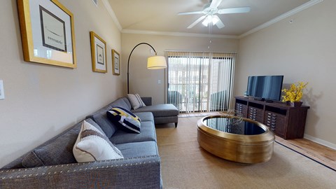 a living room with a couch and a coffee table