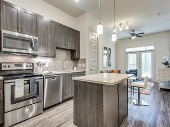 grey kitchen package at Inwood Apartments in Dallas, TX