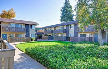 exterior shot showing off the private patios and balconies at Wyndover Apartment Homes in Novato, CA