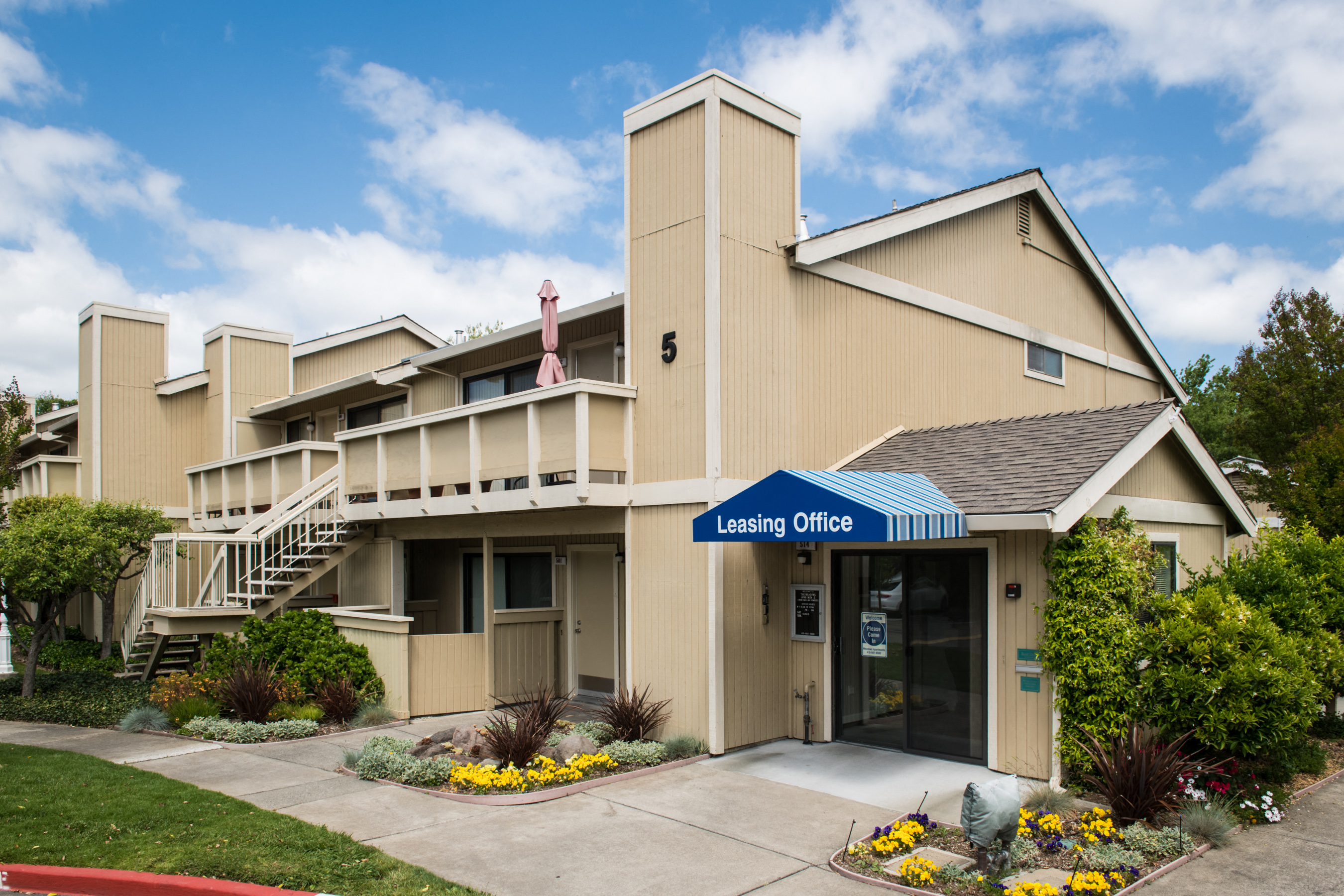 the exterior of the leasing office at the lambs office building