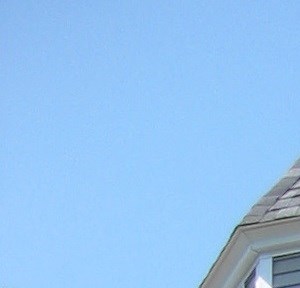 the front of a house with a porch