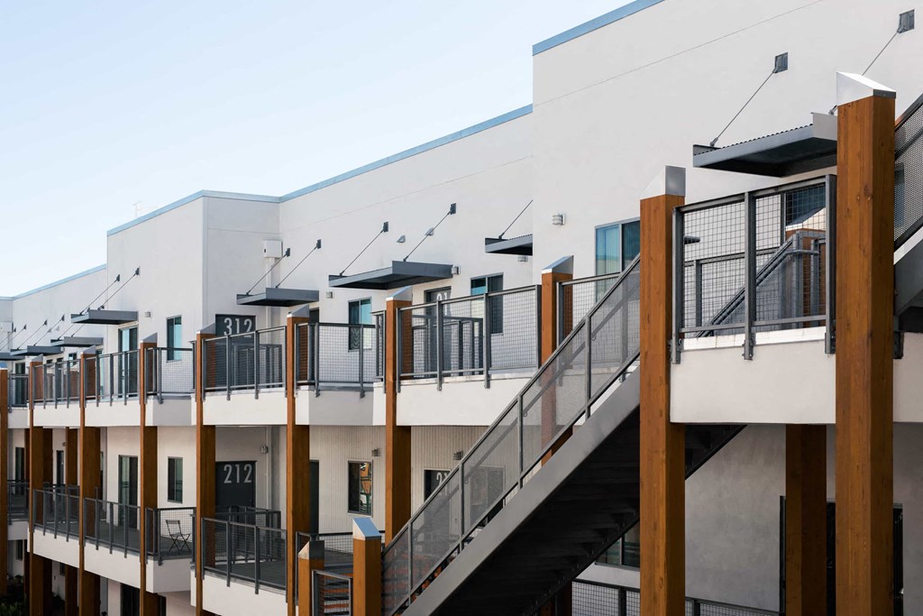 a view of the side of a building with stairs