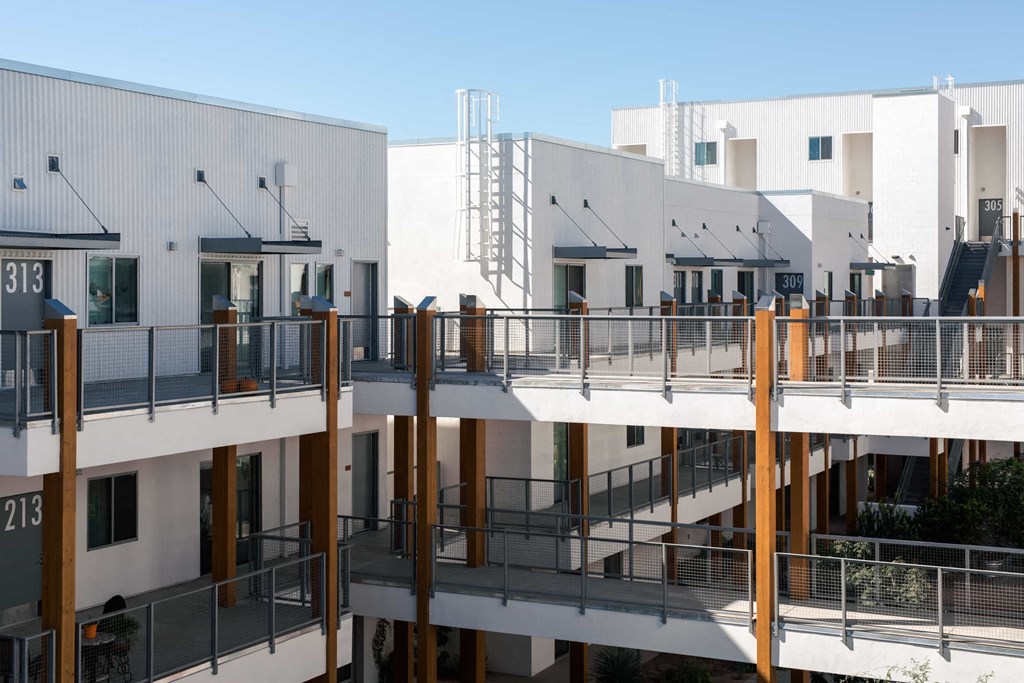 a view of a group of buildings with balconies