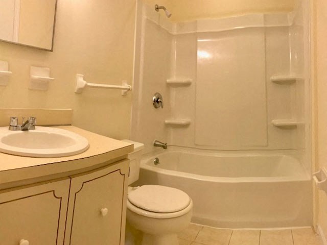a bathroom with a sink toilet and a bath tub
