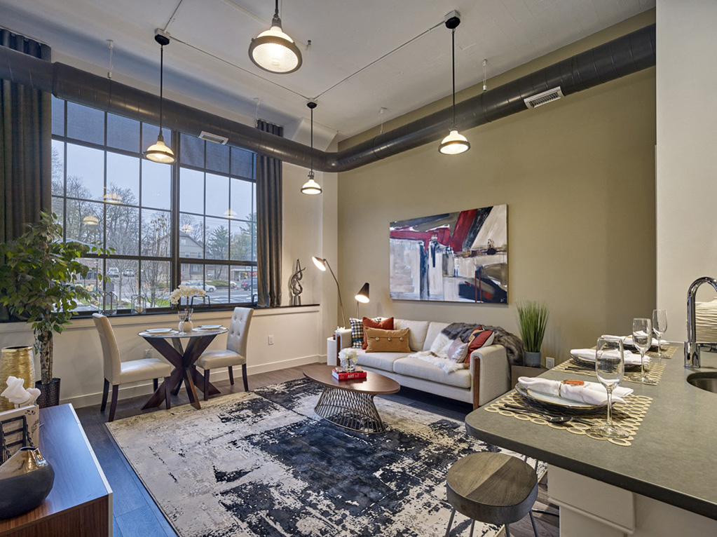 a living room with a couch and a table