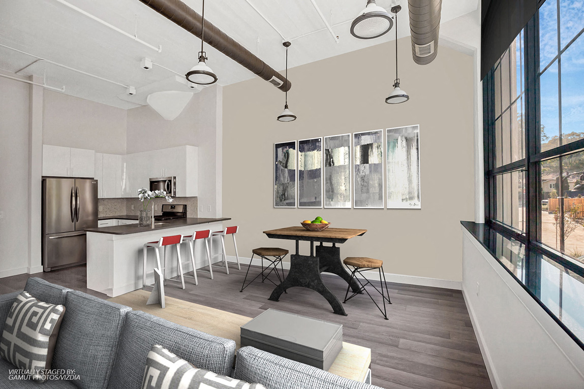 a living room and kitchen in a modern apartment