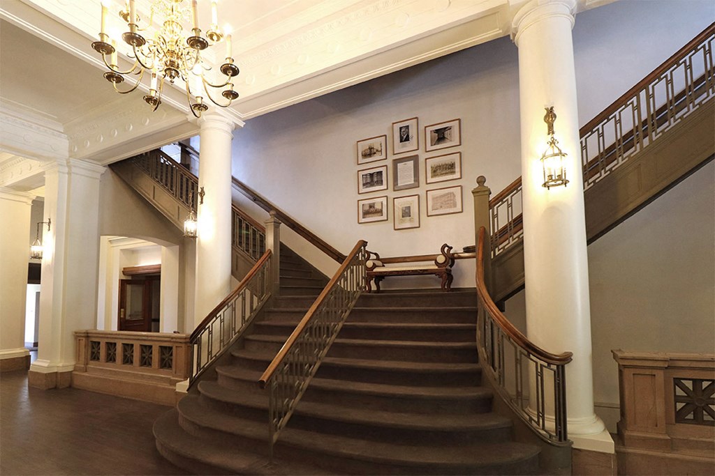 a view of the stairs in the hall of the building
