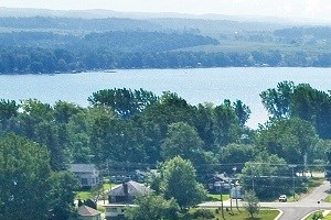 an aerial view of a neighborhood with houses and a parking lot