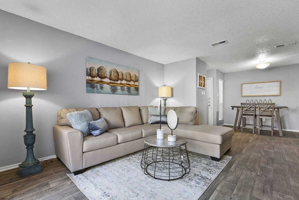a living room with a couch and a table