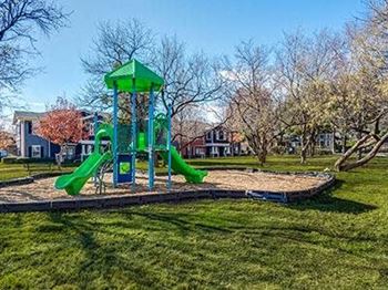 Amenities - Courtyard With Playground at Bardin Greene Apartments
