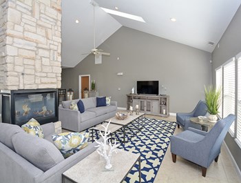 Clubhouse Lounge and Fireplace Fireplace and TV in the Clubhouse Lounge - Photo Gallery 5
