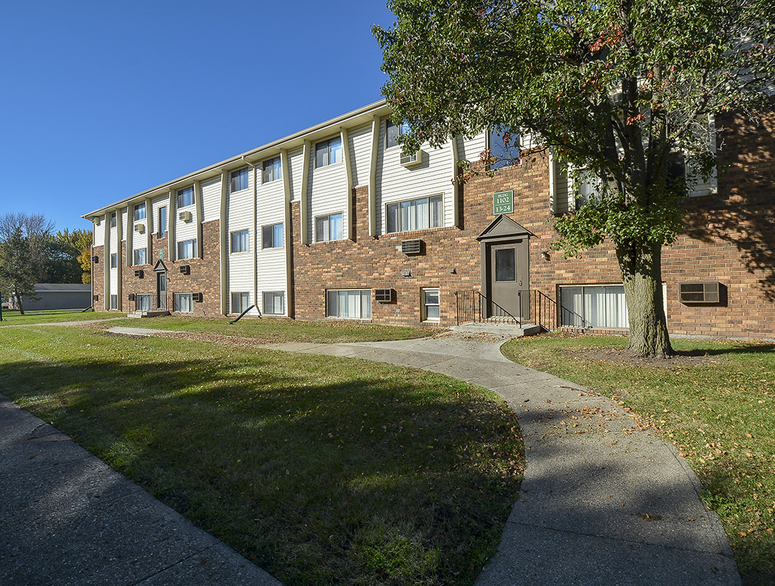 Paved Sidewalk Leading to an Entry Way Door at Timberland at Crestbruck