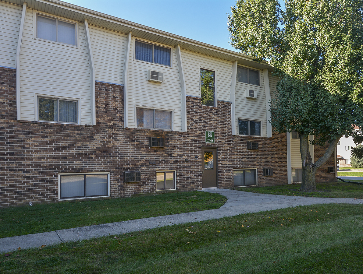 Partial Brick Exteriors on the Timberland at Crestbruck Apartment Buildings