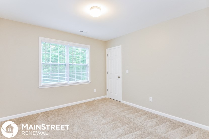 the upstairs bedroom is clean and ready to be used as a home office