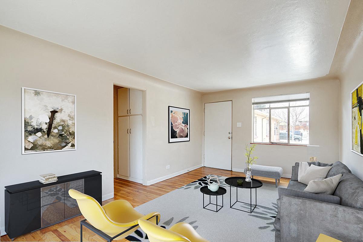 a living room with a couch and a table