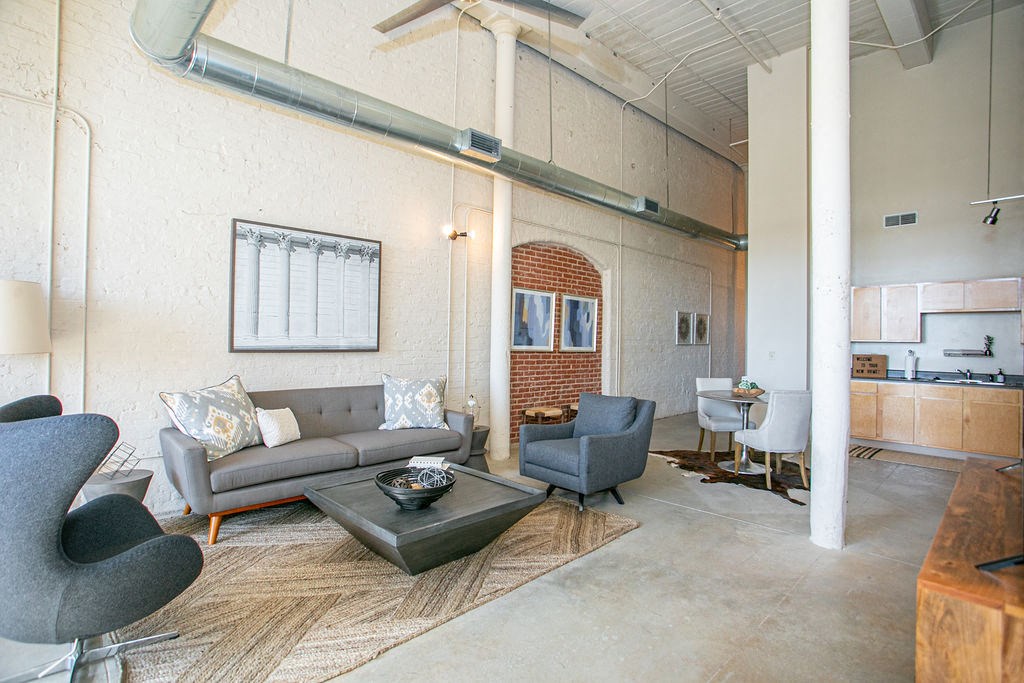 a living room with a couch and a coffee table
